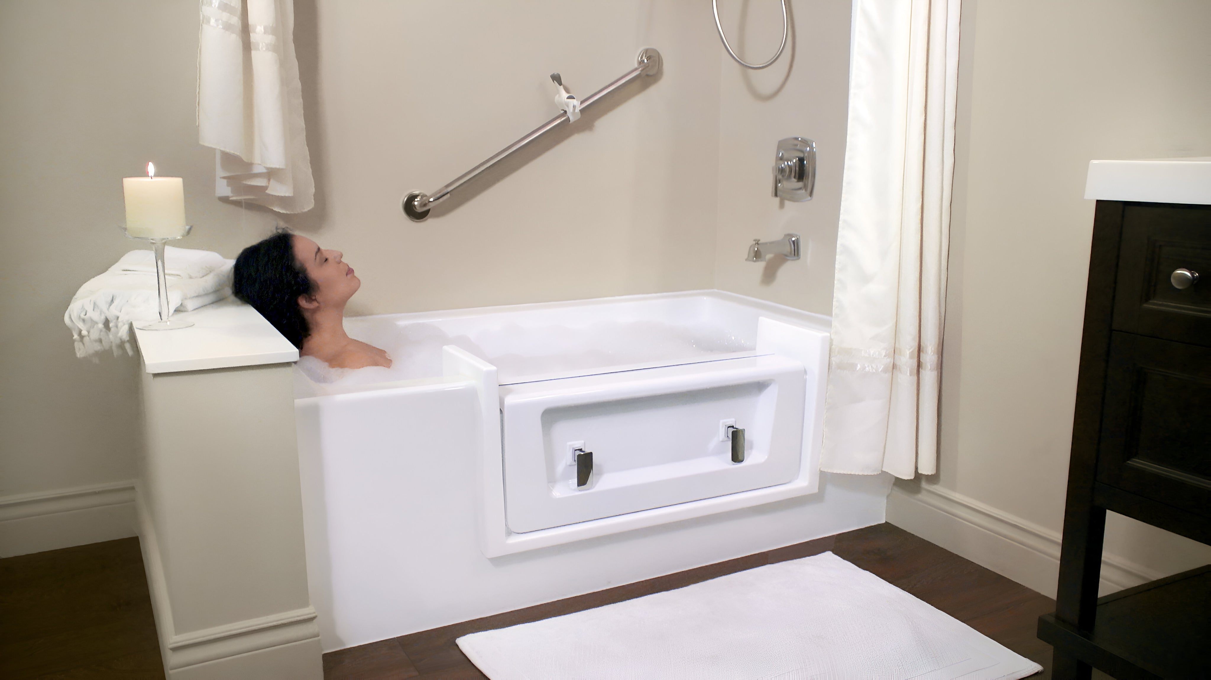 Lady soaking in bathtub using the Quick Tub Convertible System